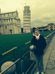 Girl in front of leaning tower of Pisa